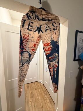 Lucky & Blessed Beige Leggings with Navy and Red Graphic Print